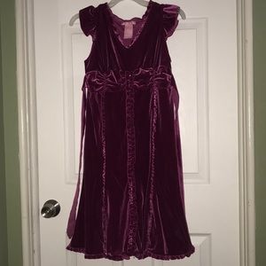 Pink formal dress for a kid.